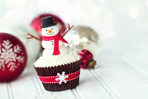 Chrismas cupcake decorated with a fondant snowman