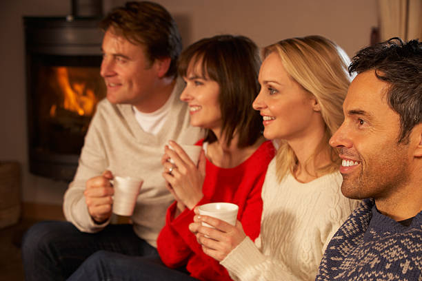 istock Group Of Middle Aged Couples Sitting On Sofa 178032164