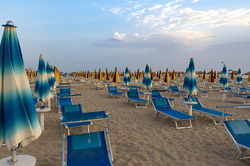 Empty deck chairs in early morning at Rivazzurra, Rimini Italy