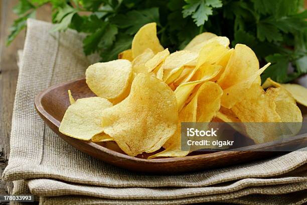 Potato Chips In Wooden Plate Stock Photo - Download Image Now - Crunchy, Fat - Nutrient, Food