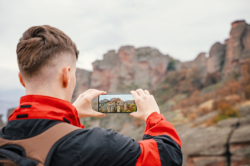 Young hiker traveling in the mountains