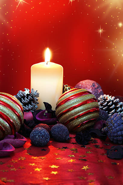 istock Christmas composition with candle and colored potpourri 178034099