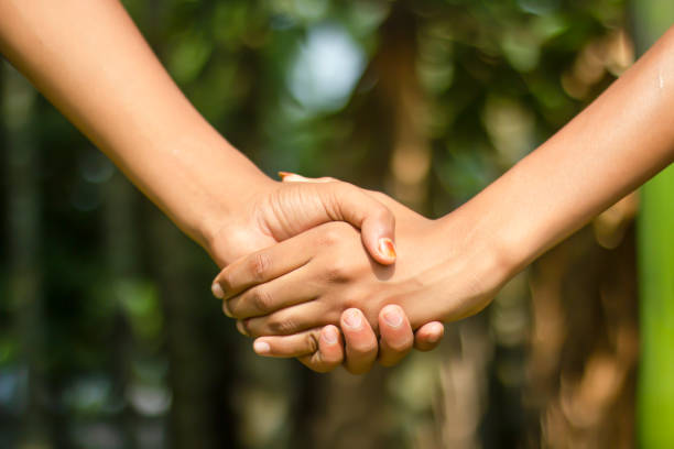 istock A man handshake with another man and blurred background 1780352272