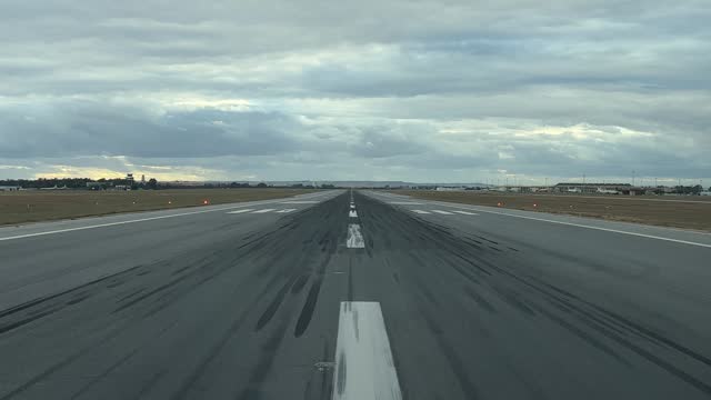 Real time take-off roll of a jet in a winter cloudy day, as seen by the pilots