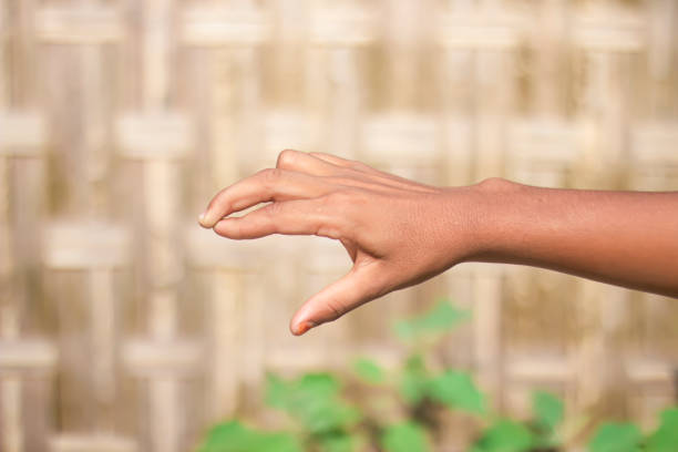 istock A man is pointing three fingers forward on his hands blurred background 1780355739