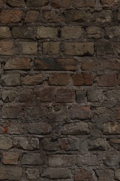 istock Vertical old brick brown wall texture. Grunge stone house for background close up 1780356919