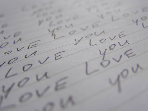istock Words Love you written on lined white paper background. Perpective view 1780362544