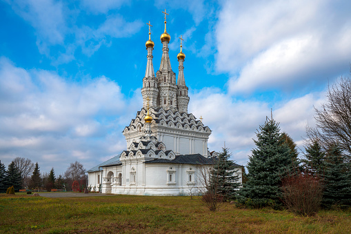 View of the Odigitrievsky Church on the territory of the Vyazma Ioanno-Predtechensky Monastery on a sunny day with clouds, Vyazma, Smolensk region, Russia