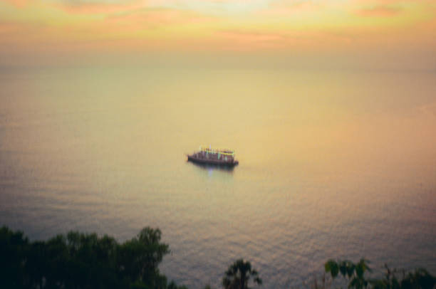 Tranquil view of ferry traveling at sunset. Shot on camera film