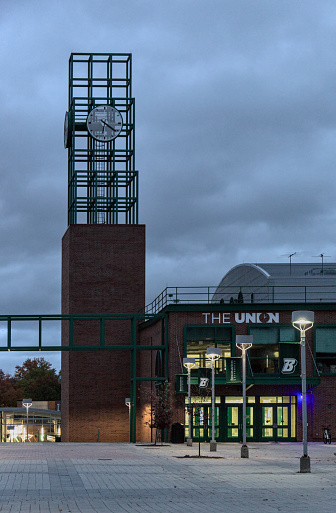 Binghamton, NY - Oct 23, 2023: Binghamton University student union with clock tower at night.