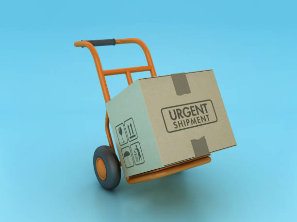 istock Hand Truck Carrying Cardboard Box with Urgent Shipment Words 1780378793