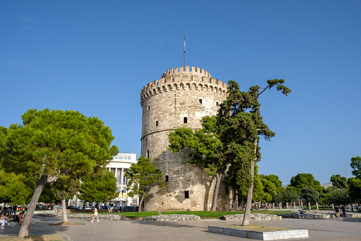 Thessaloniki, Greece - September 22, 2023 : View of the White Tower, a monument and museum on the waterfront in Thessaloniki Greece
