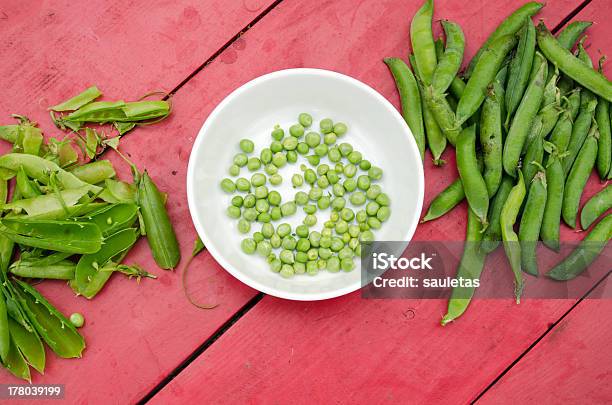 Peas Shell Husk White Plate Dish Red Table Stock Photo - Download Image Now - Activity, Agriculture, Backgrounds