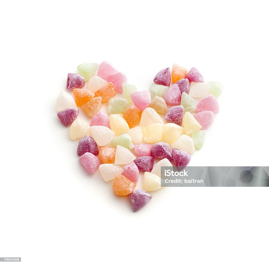 multicolored candy hearts arranged in the shape of a heart Backgrounds Stock Photo