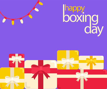 Gift packages with happy boxing day text on purple background