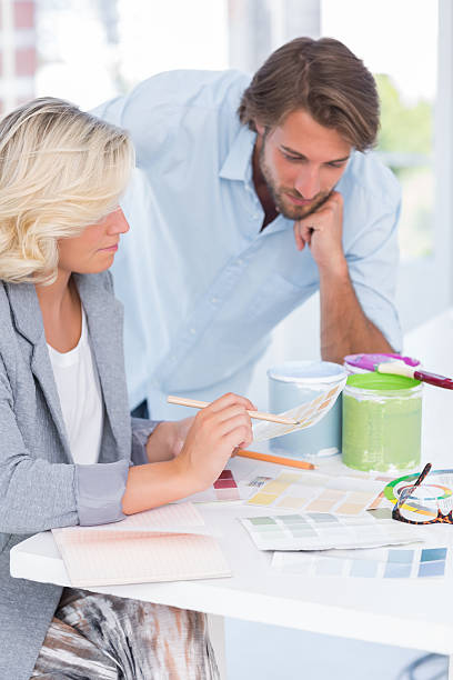 istock Colleagues of interior design working together on colour charts 178046295