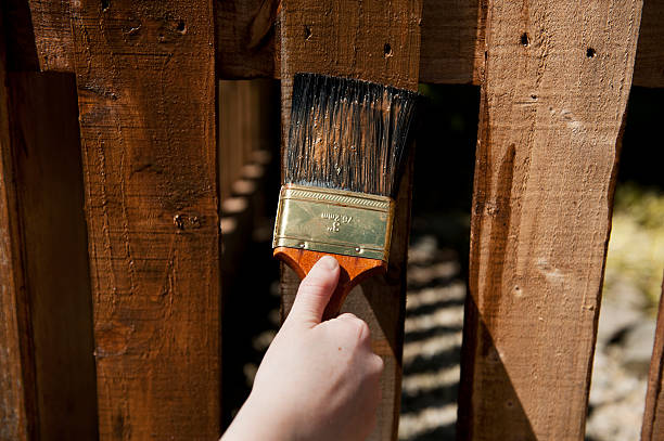 istock Painting the Fence 178046707