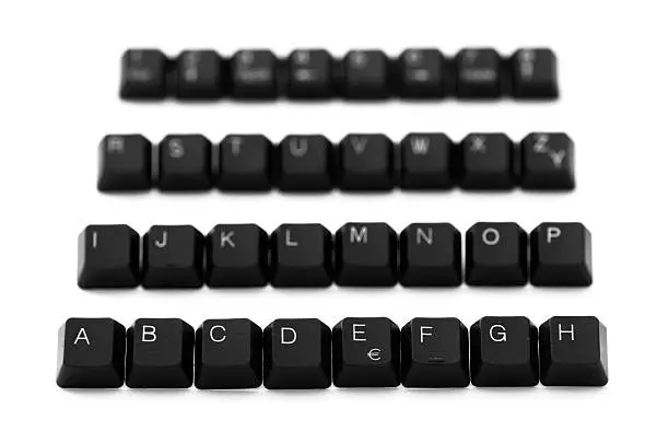 Alphabet of keyboard keys isolated on a white background.