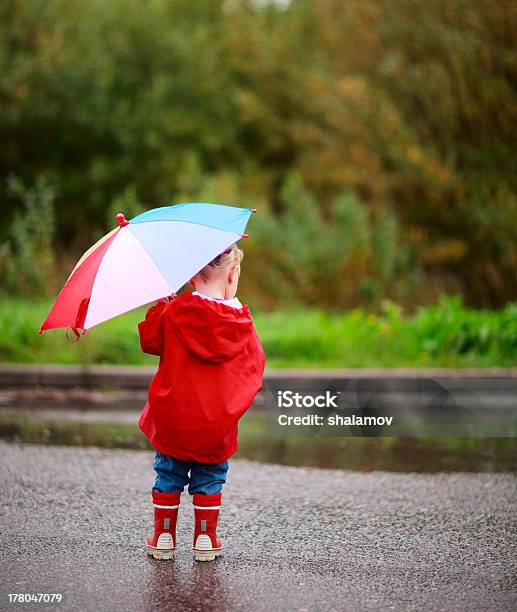 Toddler Girl With Umbrella Stock Photo - Download Image Now - Autumn, Casual Clothing, Child