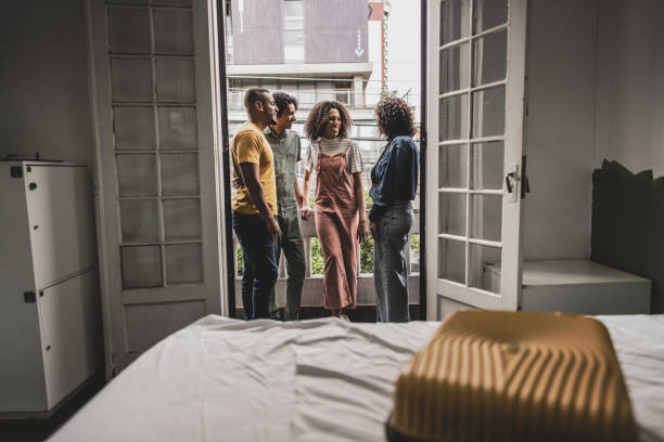 istock Friends talking at hostel room 1780471361