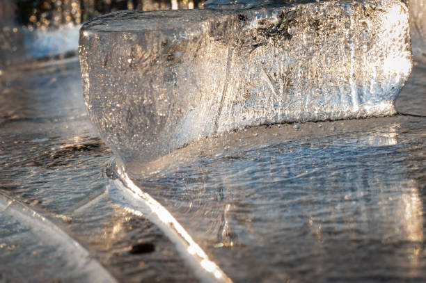 istock Ice, green grass and incredible abstract winter patterns, created by nature itself 1780472359