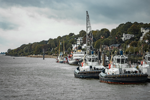 Hamburg, Germany - October 22, 2023: Tug boats in the harbour of Hamburg