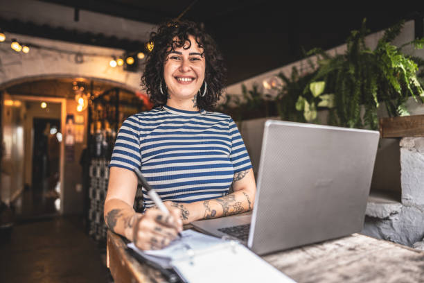 istock Receptionist working at a restaurant of hotel boutique 1780473600