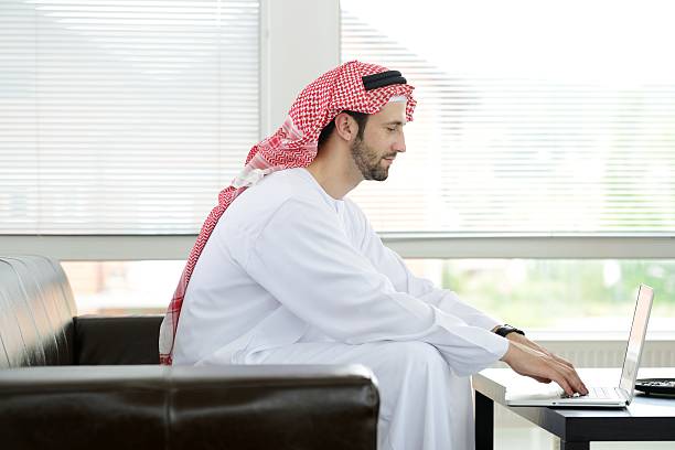 istock Portrait of a smart arabic business man using laptop 178047743