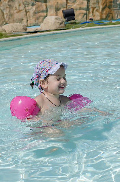 ragazza in piscina - child student adolescence cute foto e immagini stock