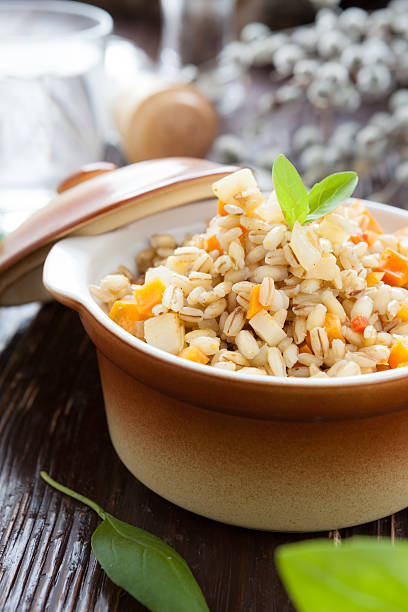 istock pearl barley and carrots cooked in a pot 178049906