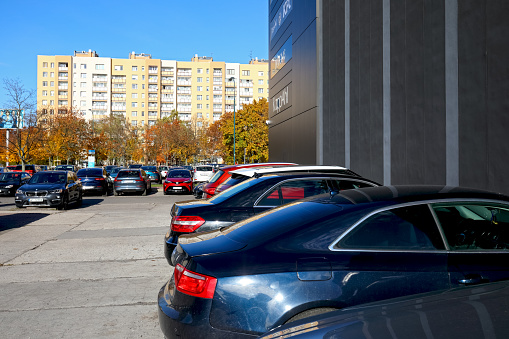 Warsaw, Poland - October 30, 2023: Cars parked in the local car park in the Goclaw housing estate in the Praga-Poludnie district.