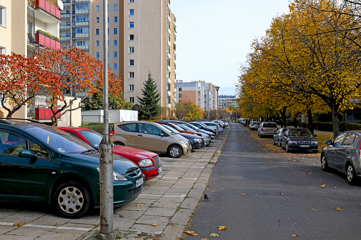 Warsaw, Poland - October 30, 2023: Many cars parked in a local car park in the Goclaw housing estate in the Praga-Poludnie district.