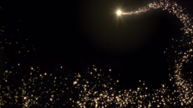 Christmas shooting star with a tail of golden particles