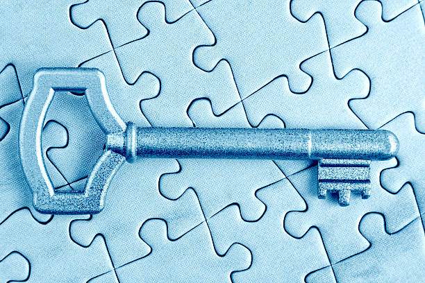 istock The key to puzzle close in cold tones. 178051557