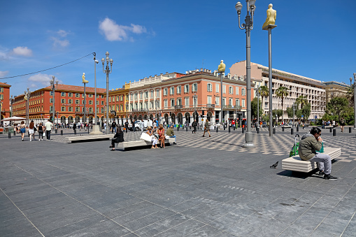 Nice, France - April 26, 2023: The main square of the city, Place Massena. The square is often visited by tourists and locals and usually sees a lot of pedestrian traffic.