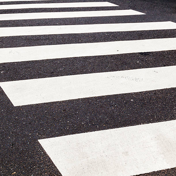 istock pedestrian crossing marked with white paint 178052204