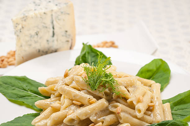 istock Italian pasta penne gorgonzola and pine nuts 178052620