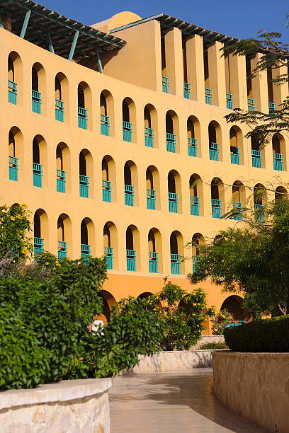 istock Luxury hotel facade in morning sun light 178053074