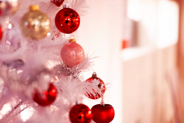 istock Christmas Tree in Front of a Window 1780530914