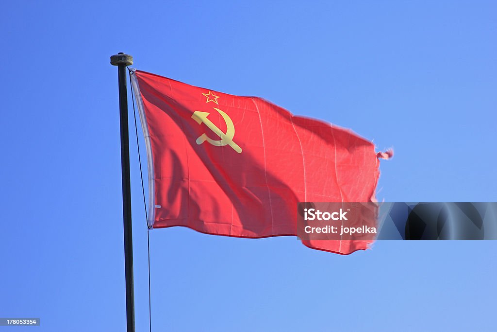 Flag of the former Soviet Union Flag of the former Soviet Union before a blue sky Communist Flag Stock Photo