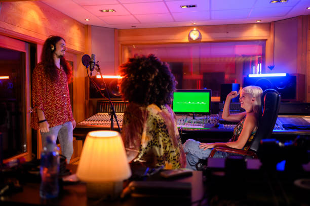 istock A singer is recording a song in a music studio. 1780537718