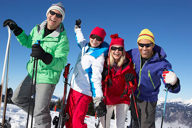 istock Two happy couples on a ski holiday in the mountains 178053925