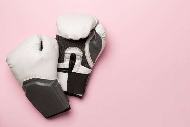 istock Martial arts gloves on color background, top view 1780545310