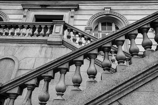 City of Santos, Brazil.11.05.2023. Side stairs of the José Bonifácio palace, headquarters of Santos city hall located in Visconde de Mauá square , in downtown. Black and white image.