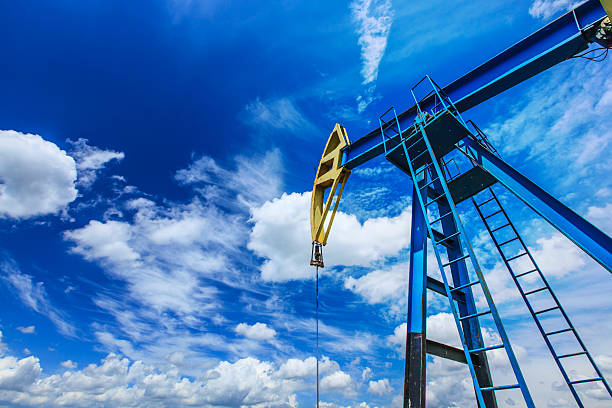 Operating oil and gas well detail Operating oil and gas well in active oilfield in Europe natural gas extraction stock pictures, royalty-free photos & images