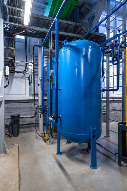 istock Water filter warehouse with four large blue tanks 1780552742
