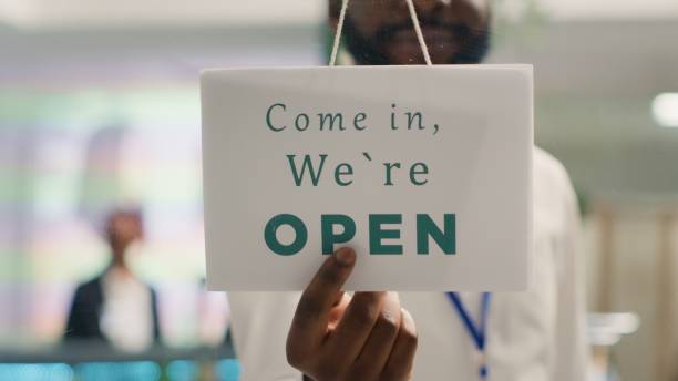 istock Retail assistant closing clothing store 1780554733