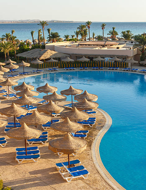 istock pool, beach umbrellas and the Red Sea in Egypt 178055665