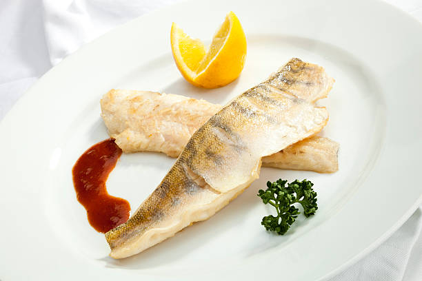 Grilled Pike perch with lemon stock photo
