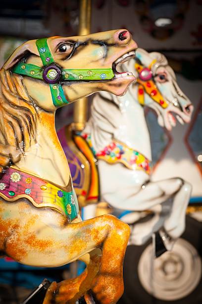 istock marry-go-round horses at a carnival 178056071